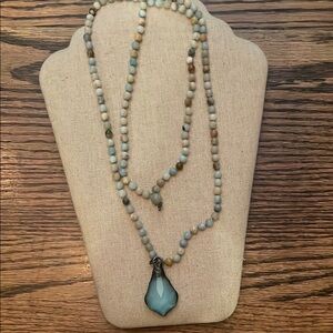 Elegant Beaded Necklace with Blue Pendant
